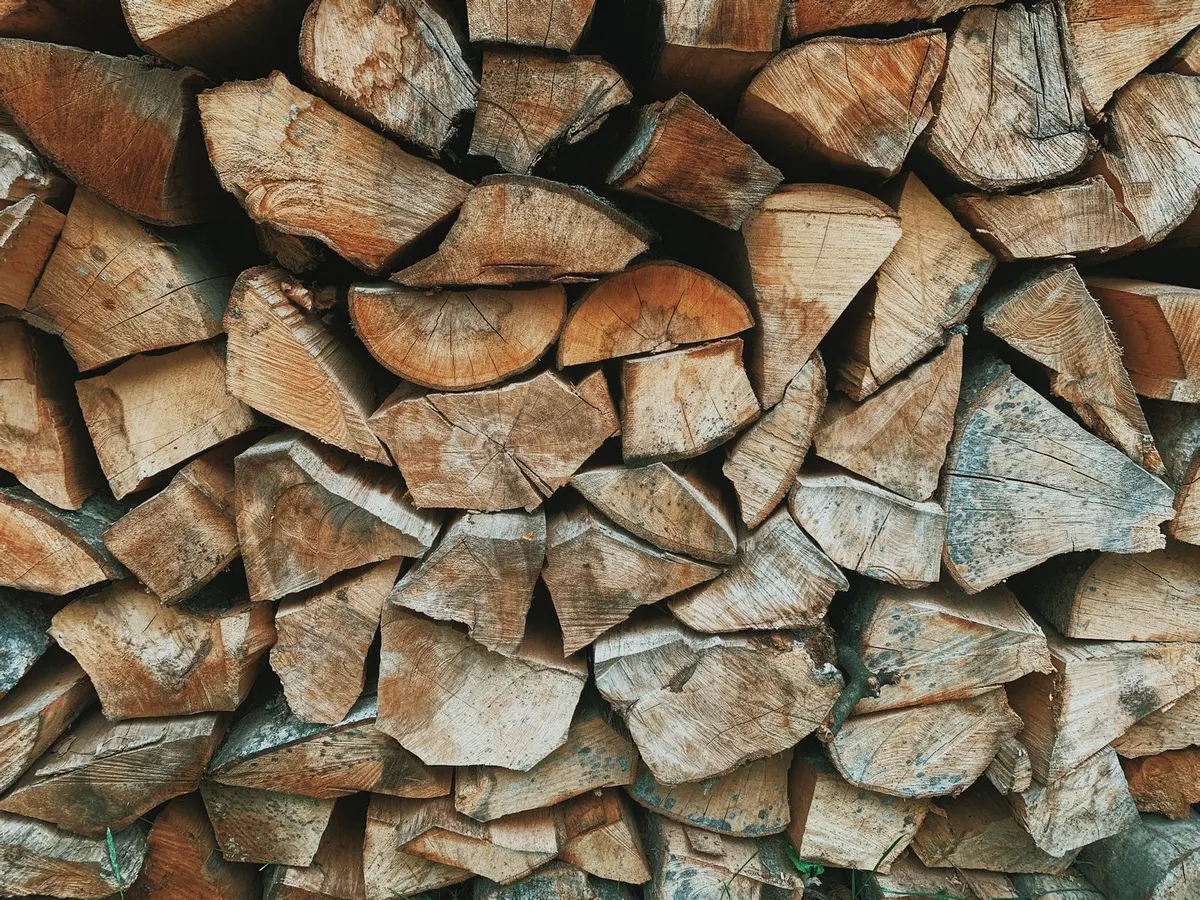 Close-up of a stack of split firewood logs
